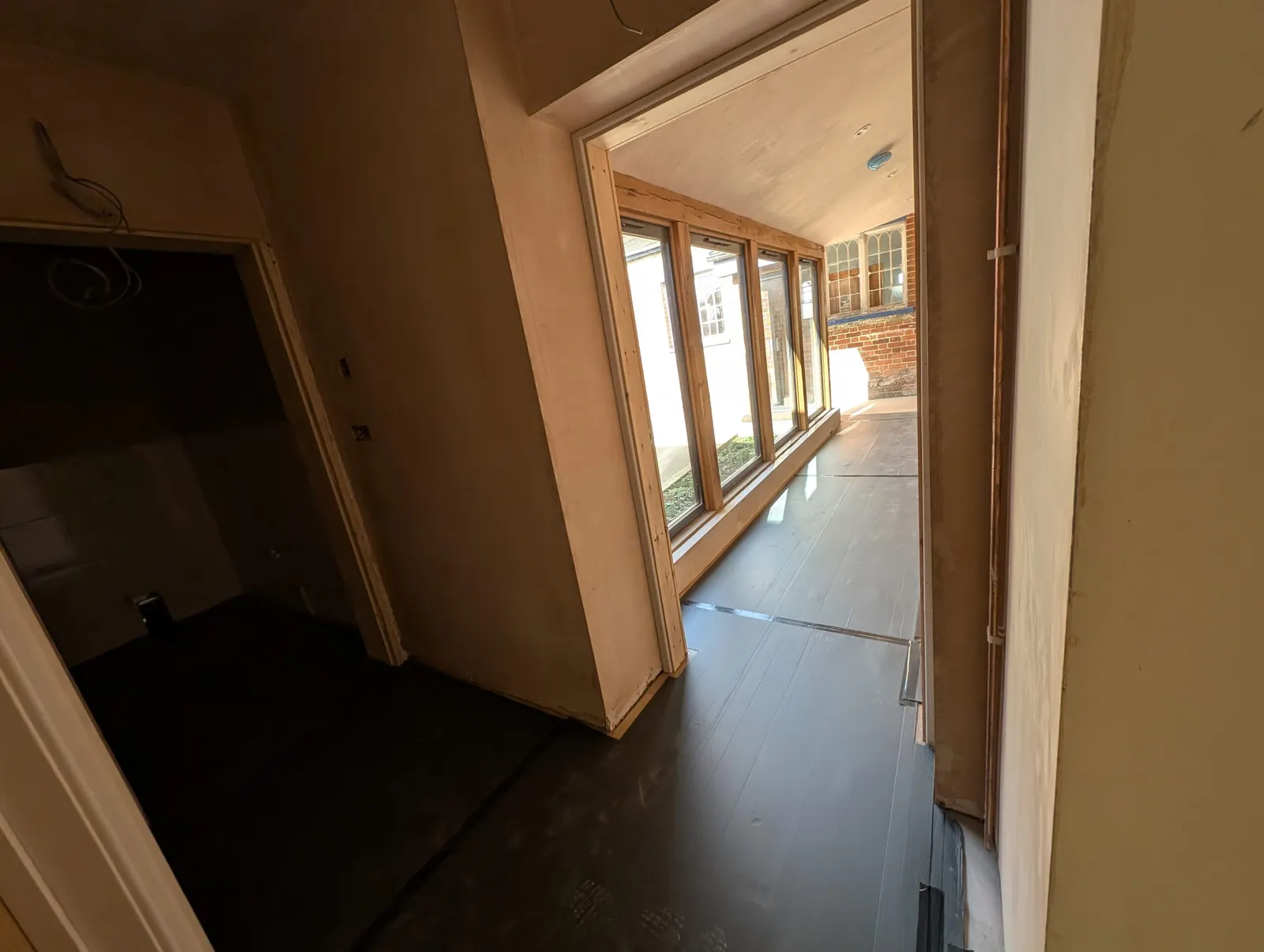 The corridor opening onto the new glazed walkway