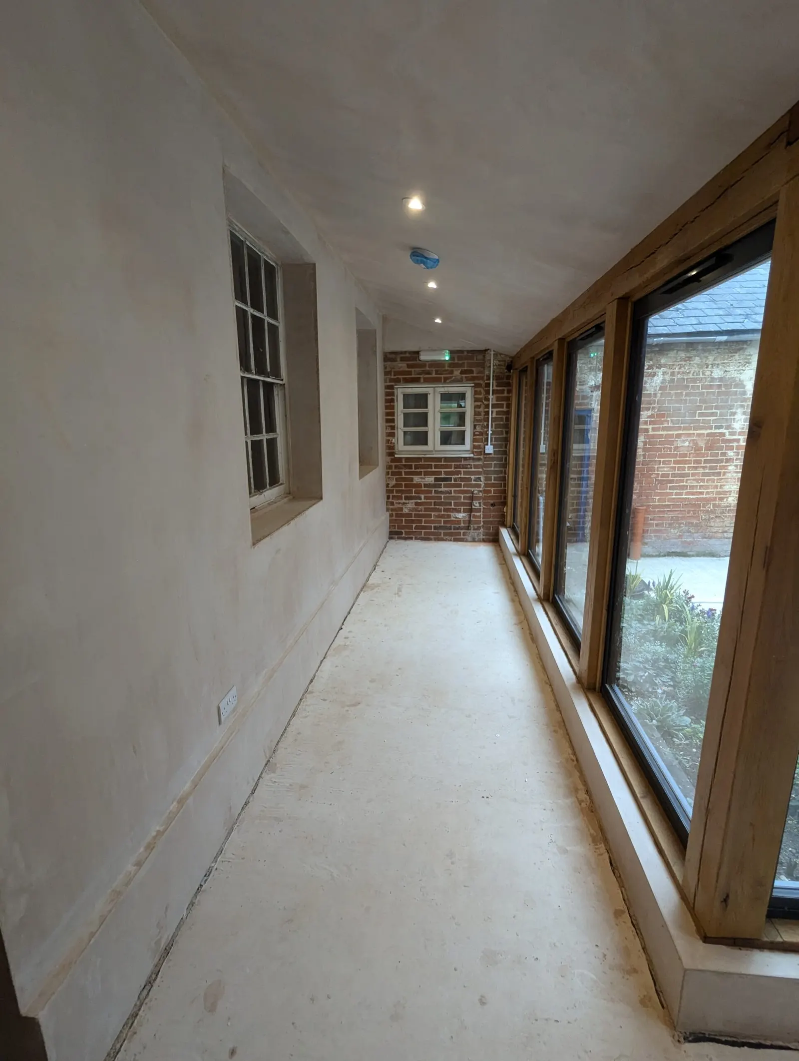 Inside the new corridor before plastering was finished