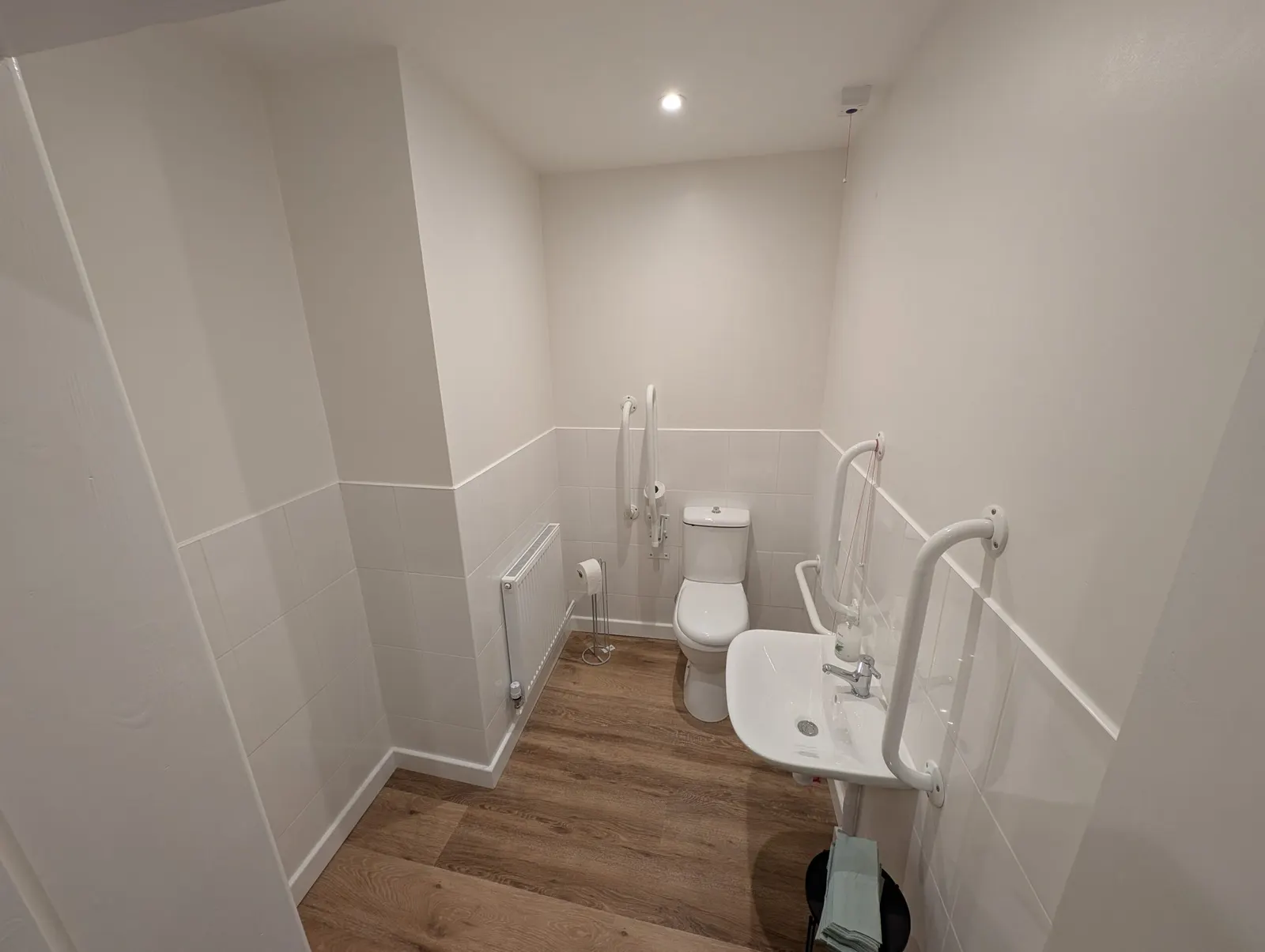 The new accessible toilet, fitted with grab rails and a low-level sink